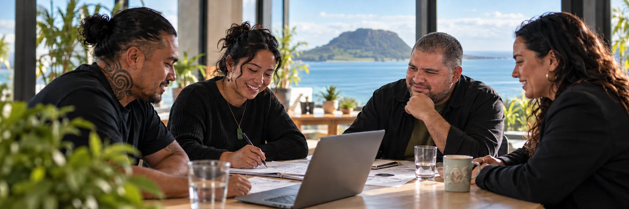 Artwork of Kory collaborating with a group around a table, with Mauao beyond the windows